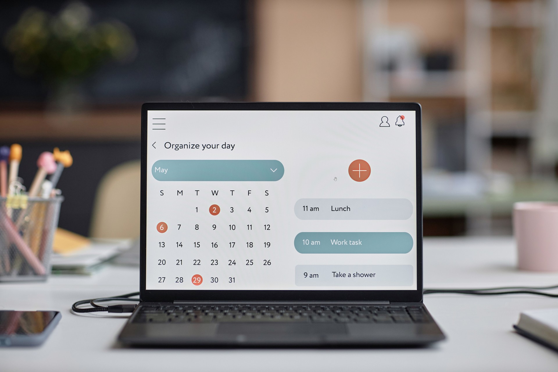 Laptop Computer on Table with Calendar on Screen